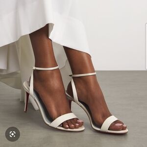 Christian Louboutin Ivory Heels with Signature Red Soles